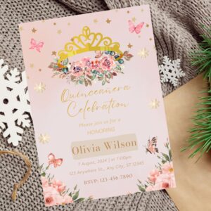 Pink floral quinceañera invitation with gold crown and elegant rose details.