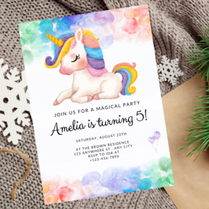 Pastel unicorn birthday invitation with rainbow and stars for a 1st birthday girl
