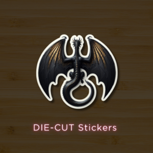 Die-cut dragon sticker with black and gold wings on a wooden background